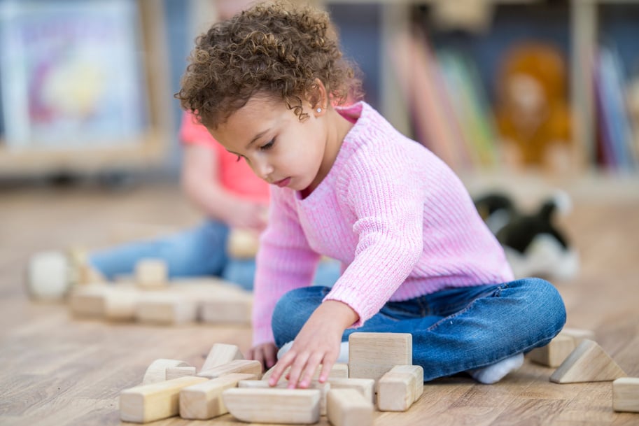 Preschool kid playing